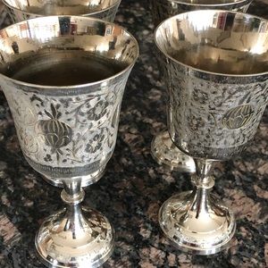 Spanish etched silver wine goblet.